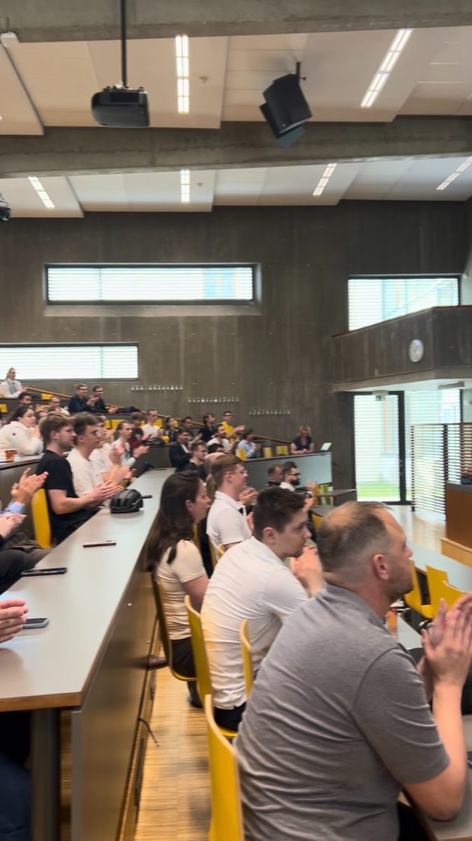 A packed lecture hall
                                        at FIT VUT during the Excel@FIT 2026 morning panel
