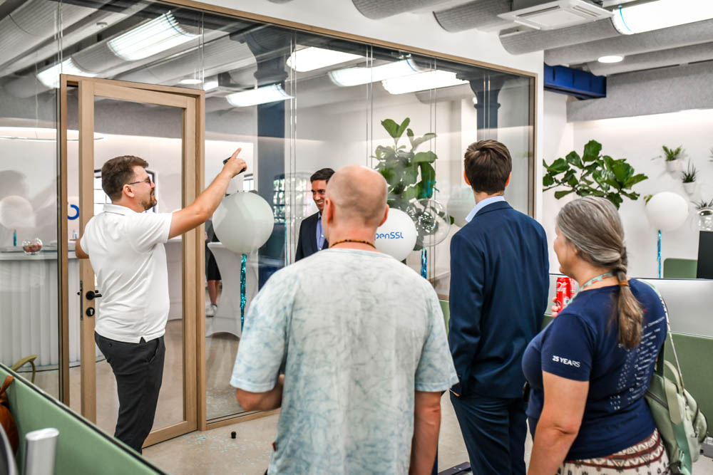 During the office tour, Anton Arapov, Director, highlights the distinctive recycled lighting