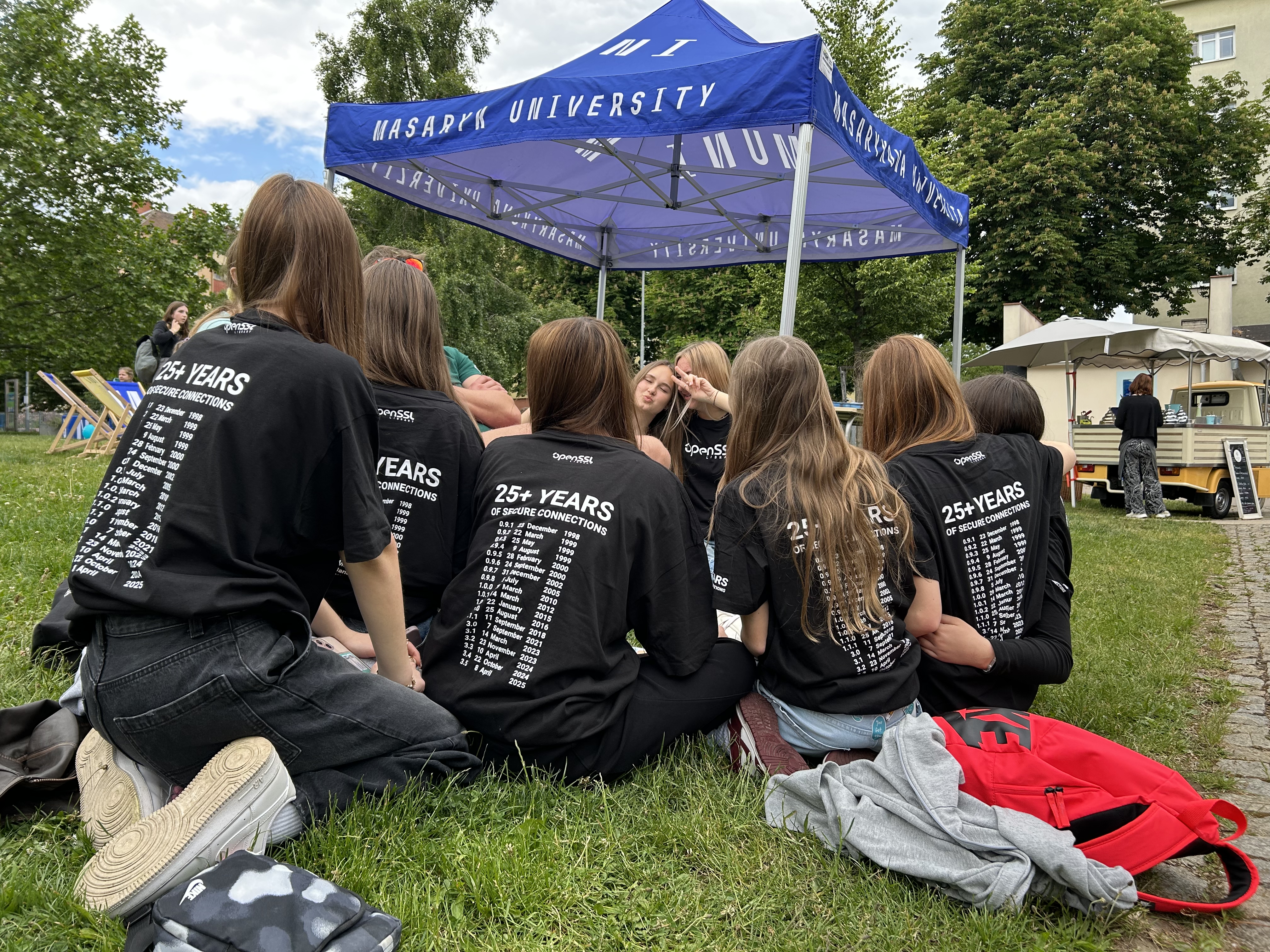 A group of students wearing the OpenSSL Library t-shirts